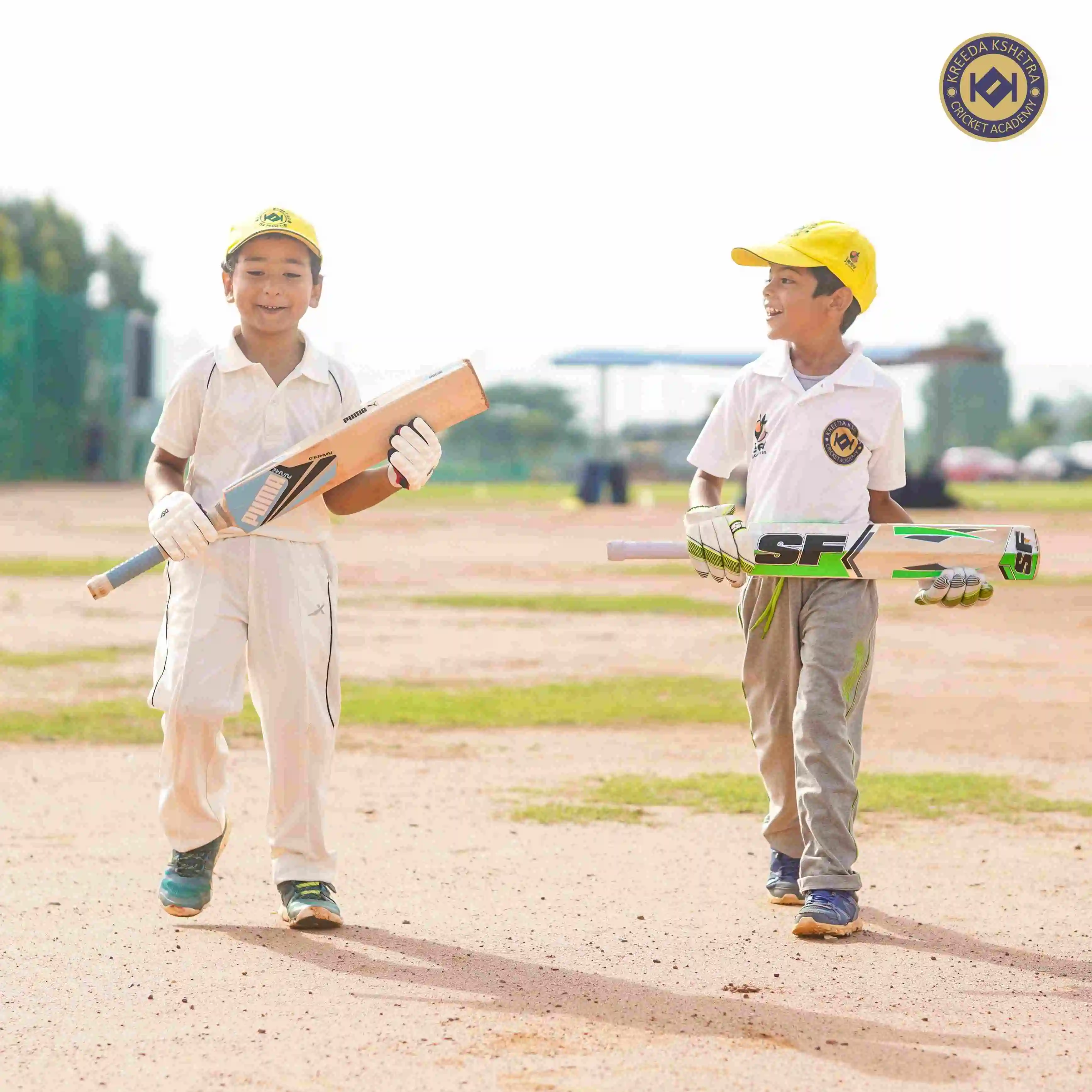kids holding bats