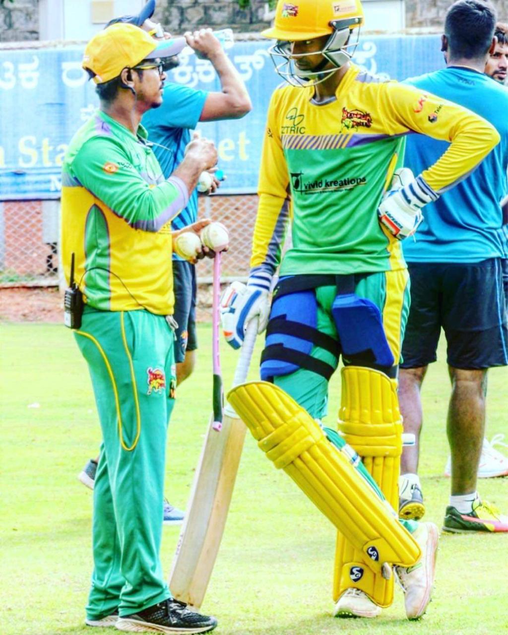 coach and player discussing